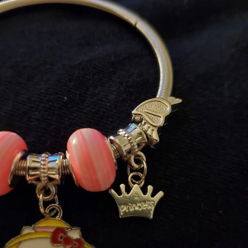 Aw so adorable! Hello Kitty Pink and Silver Charm Jewelry stretch Bracelet